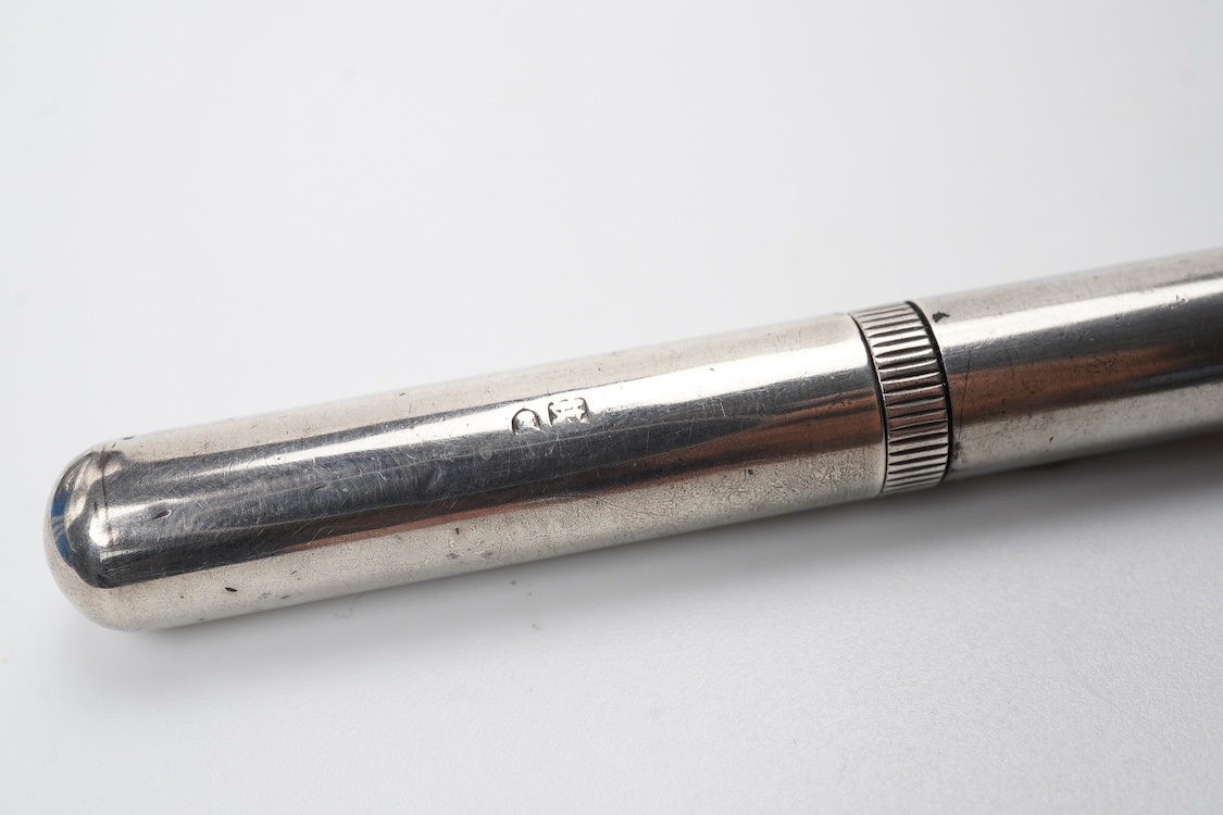 A De la Rue Onoto Sterling silver piston filler with fine flexible nib and over-and-under feed